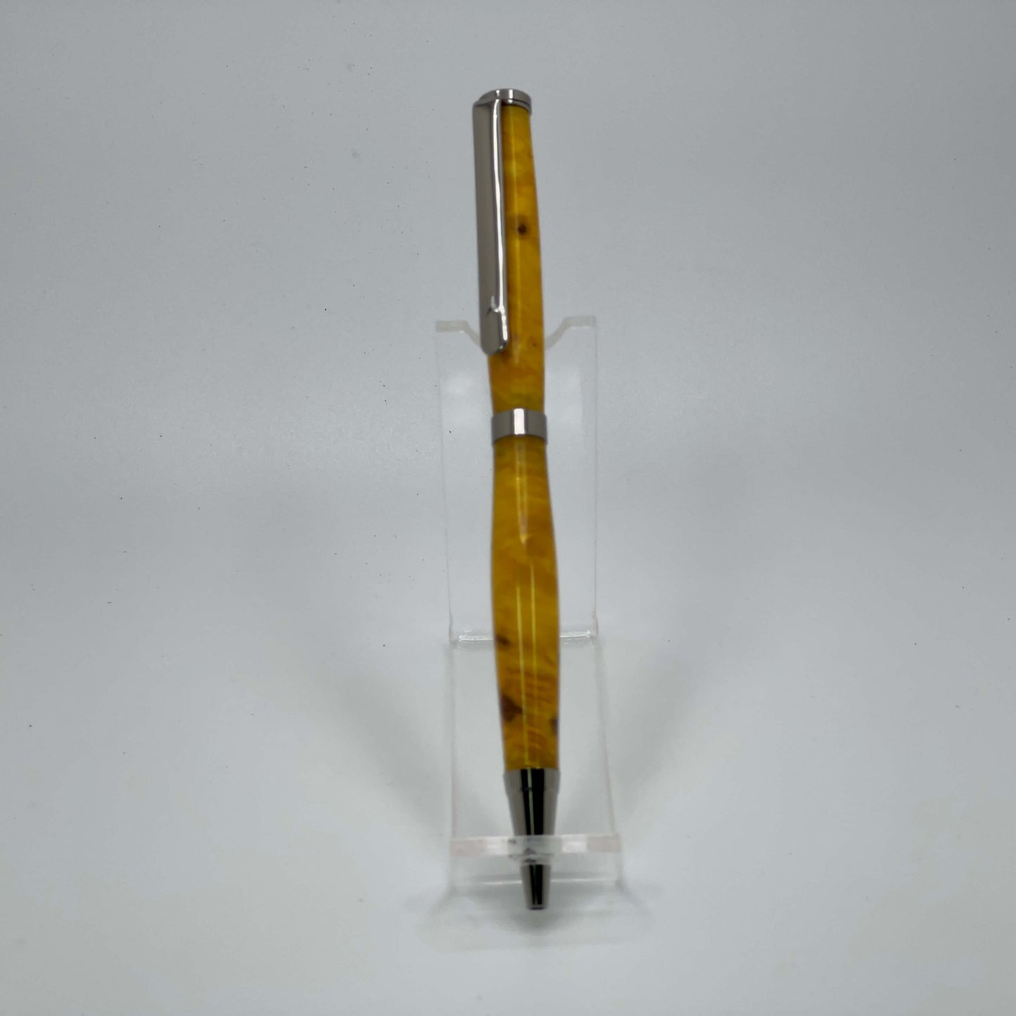 Front view of handcrafted pen with Box Elder Burl wood dyed yellow