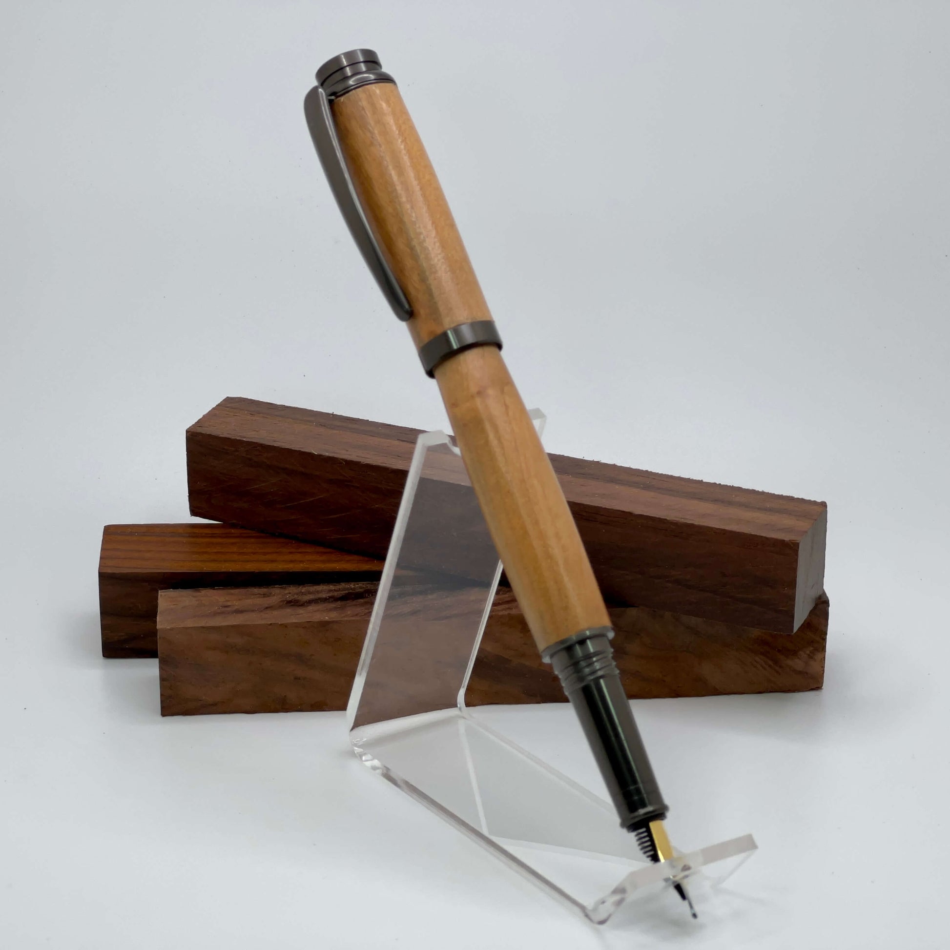 Handcrafted pen with cherry wood and satin gunmetal hardware fountain pen cap posted 