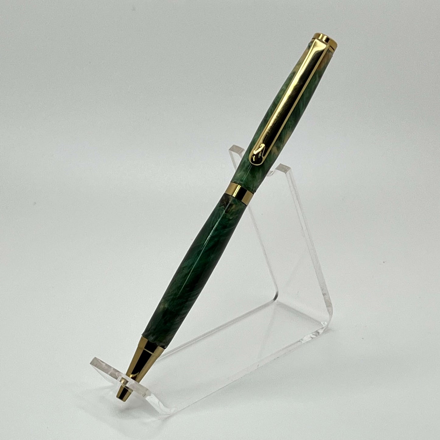 Left side view of handcrafted pen with Box Elder Burl wood dyed green
