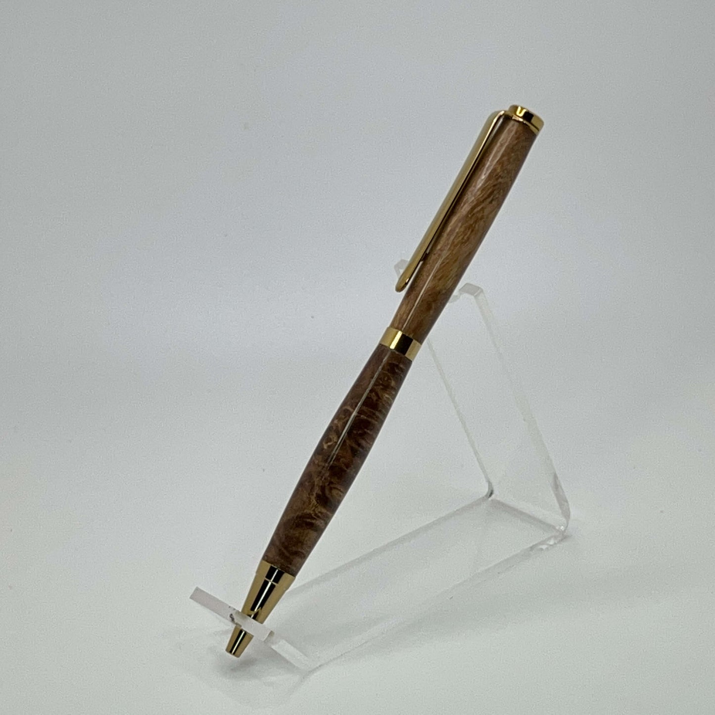 Left side view of handcrafted pen with Box Elder Burl wood dyed brown