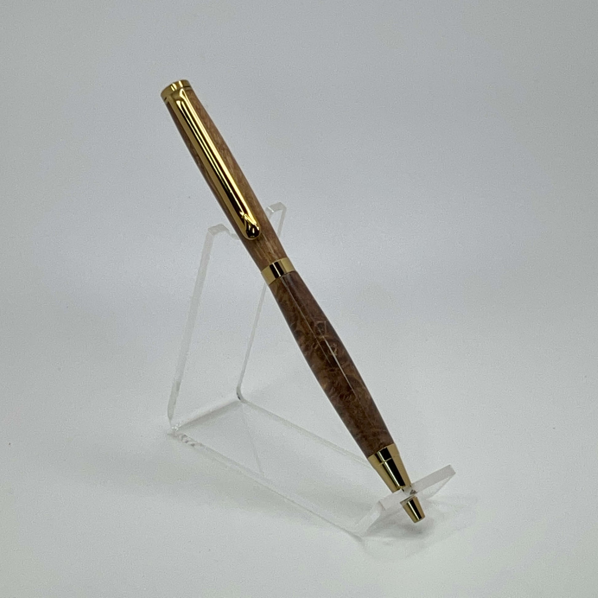 Right side view of handcrafted pen with Box Elder Burl wood dyed brown