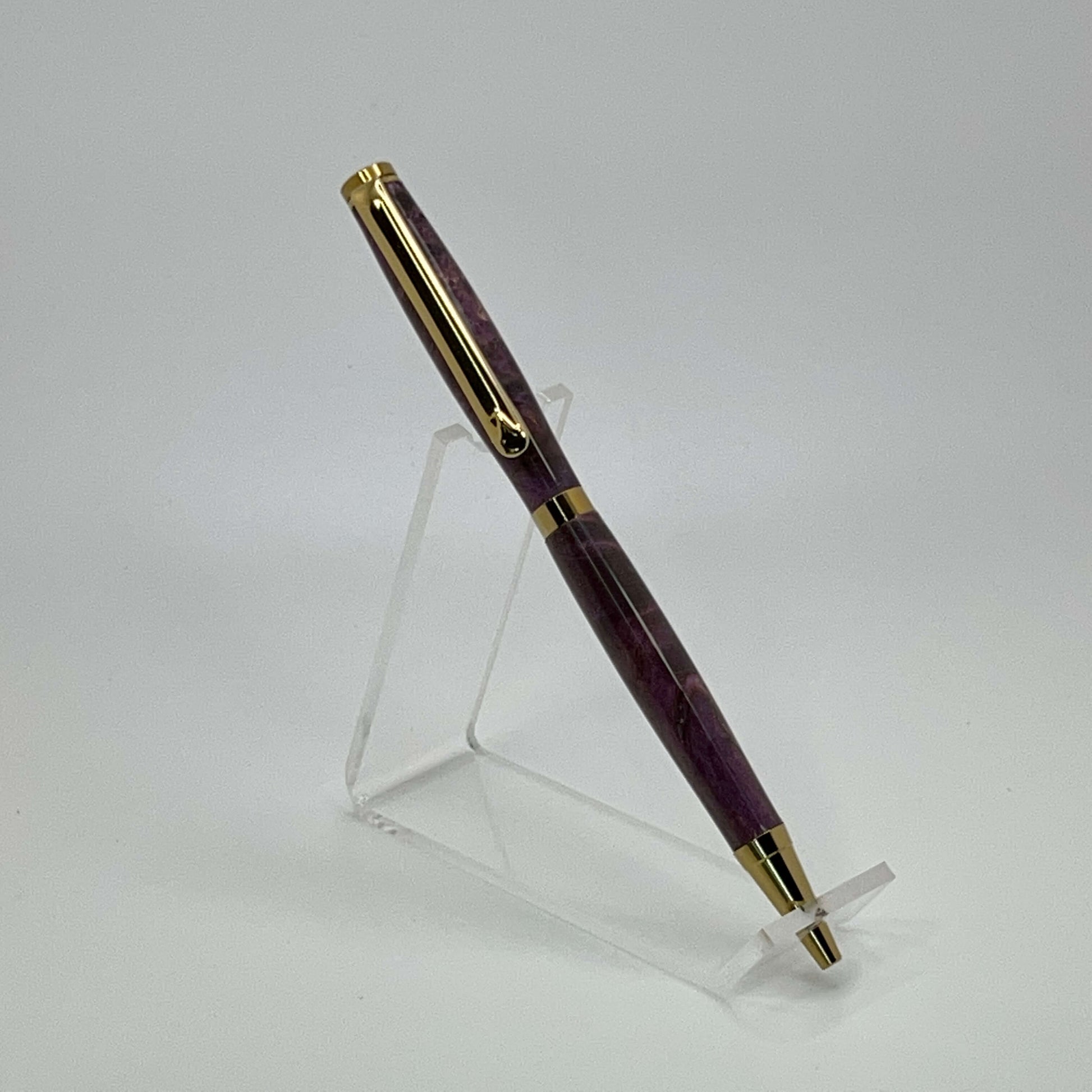 Right side view of handcrafted pen with Box Elder Burl wood dyed purple