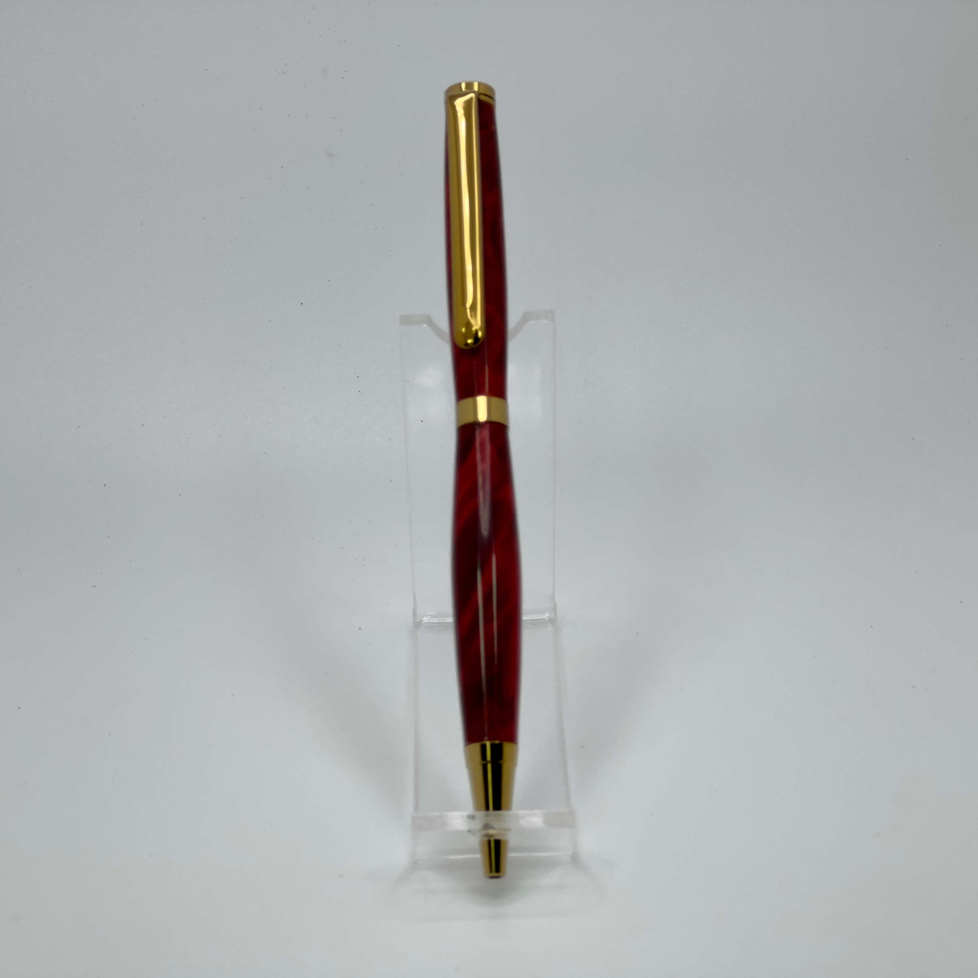 Front view of handcrafted pen with Box Elder Burl wood dyed red