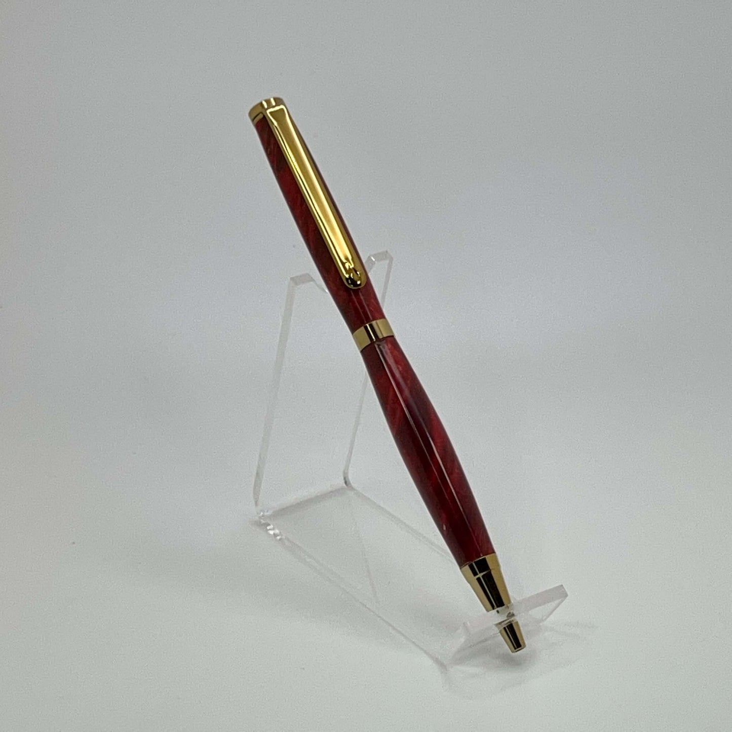 Right side view of handcrafted pen with Box Elder Burl wood dyed red
