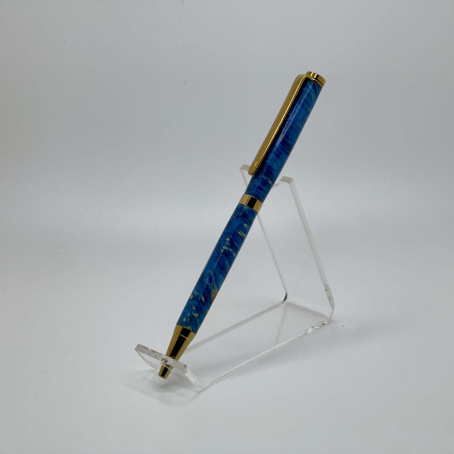 Right side view of handcrafted pen with Box Elder Burl wood dyed blue